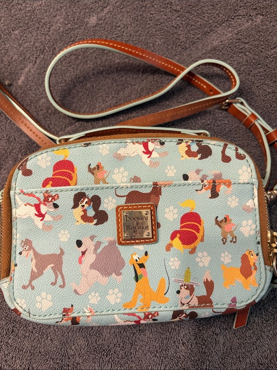 Dooney & Bourke Handbags - Dooney & Bourke Light Blue Disney Dogs Crossbody Pouch